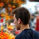 Liam O'Connell exploring a bustling market in Vietnam.